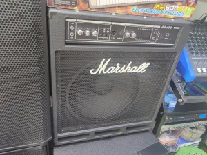 Marshall BA400 professional bass amplifier with graphic EQ, XLR DI output, effects loop, tuner output, switchable horn, and high-power speaker for live performance and studio use.